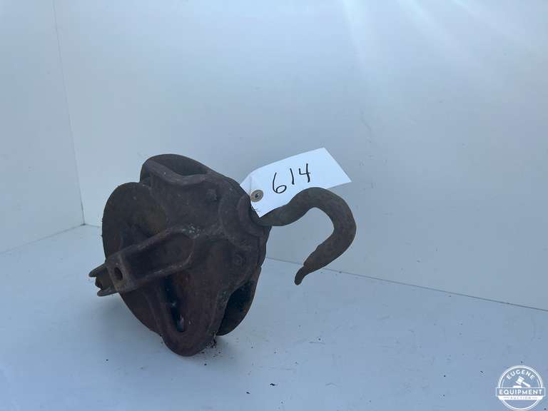 Antique Metal Logging Block