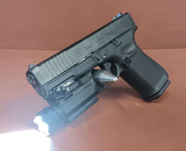Glock 19 Gen 5 9x19mm Pistol w/ NEBO Protec Elite HP 190 Tactical Light,  1 Extra Magazine & Speed Loader, In Original Case