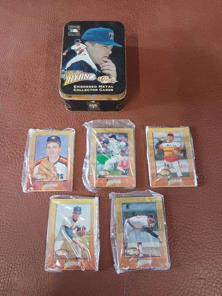 5 Nolan Ryan Embossed Metal Collector Cards in Metal Tin