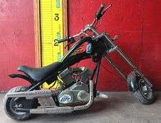 Mini Chopper Motorcycle, Two Cycle Engine, Has Compression