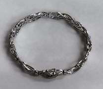 Infinity Style Tennis Bracelet