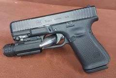 Glock 19 Gen 5 9x19mm Pistol w/ NEBO Protec Elite HP 190 Tactical Light,  1 Extra Magazine & Speed Loader, In Original Case