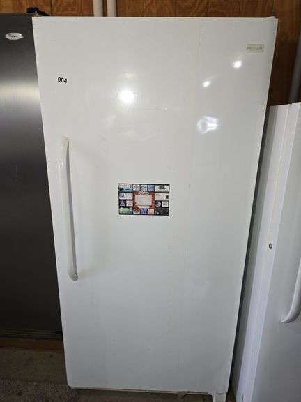 FRIGIDAIRE UPRIGHT FREEZER. 34" W X 30" D X 72 1/2" T.
