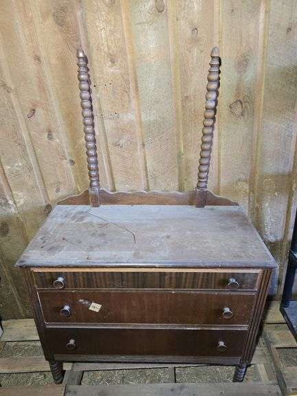 SOLID WOOD DRESSER. 37 1/2" W X 17 3/4" D X 60" T.
