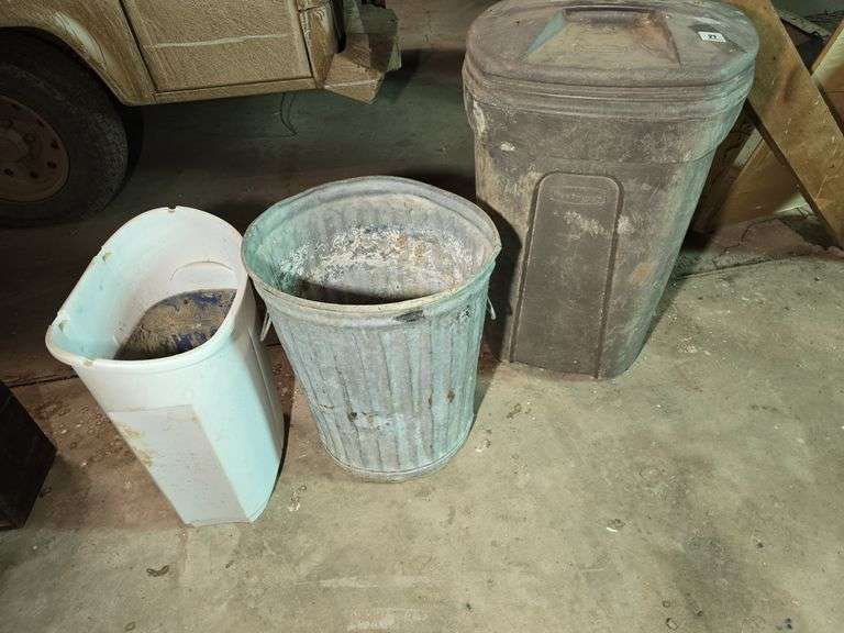 TRASH CANS.