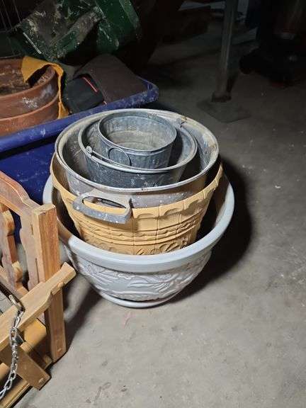 PLANTERS AND TOMATO CAGES.