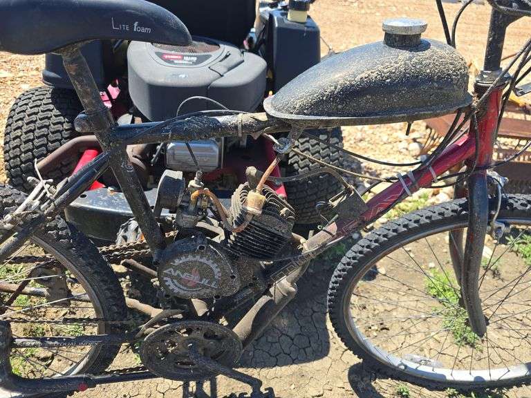 BIKE WITH ADDED ON GAS TANK AND ENGINE. RUNS, NEEDS CABLE WORK.