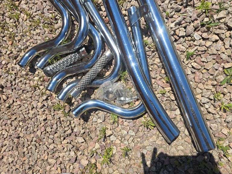 CHROME MOTORCYCLE EXHAUST PARTS.