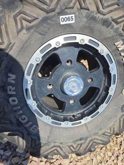 SET OF 4 POLARIS UTV TIRES AND WHEELS. NO LUG NUTS.