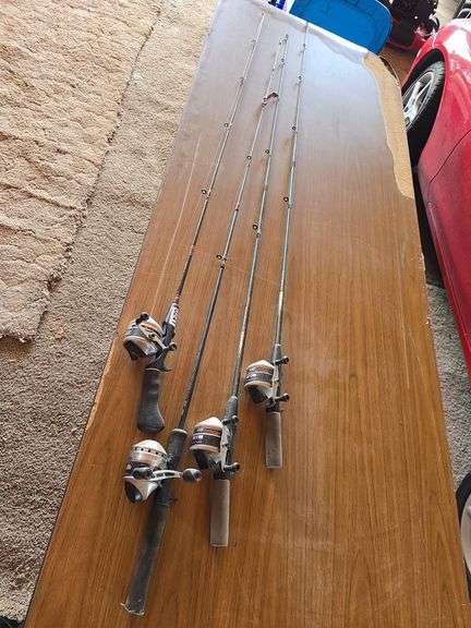 4- ZEBCO FISHING POLES WITH ZEBCO 33 REELS.