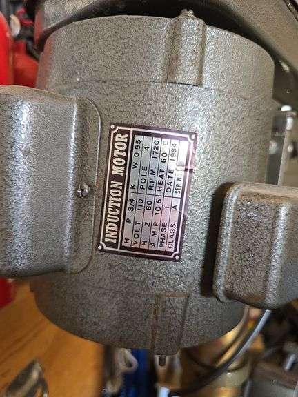 DRILL PRESS WITH VISE ON HEAVY STAND.