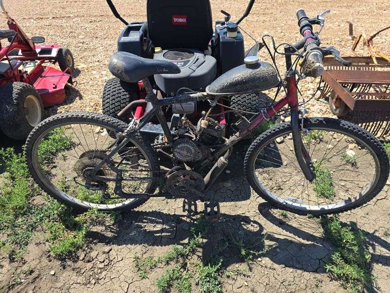 BIKE WITH ADDED ON GAS TANK AND ENGINE. RUNS, NEEDS CABLE WORK.