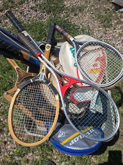BOX OF RACKETS.