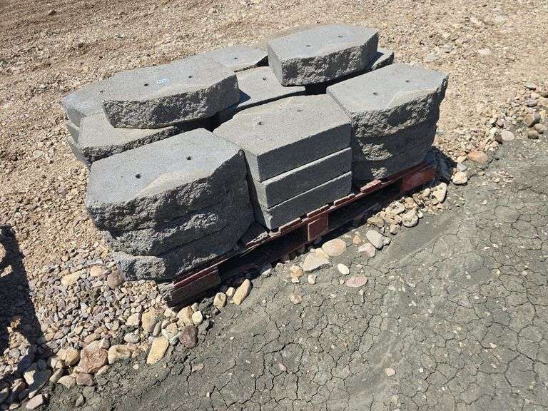 APPROX 29 LANDSCAPING ROCKS. WITH PINS.