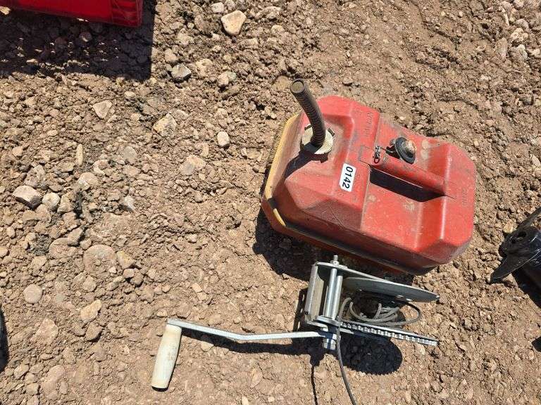 GAS TANK AND CABLE CRANK WINCH.