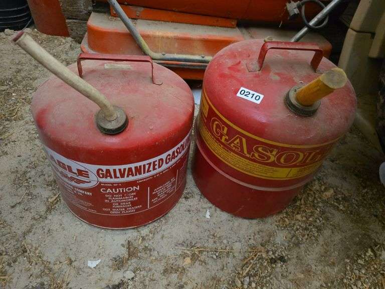 2- METAL GAS CANS.