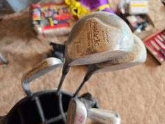 KIDS LEFT HAND GOLF CLUBS AND A FEW ADULT RIGHT HAND GOLF CLUBS.