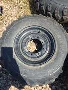 SET OF 4 POLARIS UTV TIRES WITH LUG NUTS.