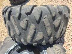 SET OF 4 POLARIS UTV TIRES AND WHEELS. NO LUG NUTS.