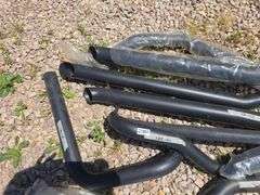 BLACK MOTORCYCLE EXHAUST PARTS.