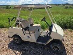 COLUMBIA GAS GOLF CART. RUNS REALLY GOOD! CAN'T SET PARK BRAKE, BRACKET NEEDS REPAIR. BATTERY. GOOD WHEELS AND TIRES JUST PUT ON!