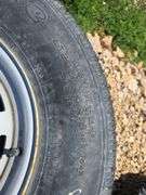 GOOD 245/75R16 TIRE ON WHEEL. OTHER 235/80R17 NO WHEEL, DECENT TREAD.
