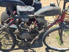 BIKE WITH ADDED ON GAS TANK AND ENGINE. RUNS, NEEDS CABLE WORK.