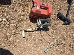 GAS TANK AND CABLE CRANK WINCH.