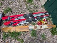 WATER SKIIS AND ROPE.