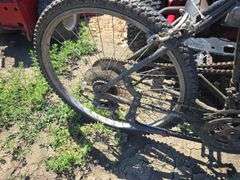 BIKE WITH ADDED ON GAS TANK AND ENGINE. RUNS, NEEDS CABLE WORK.