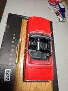 1964 1/2 MODEL MUSTANG CAR.