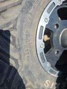 SET OF 4 POLARIS UTV TIRES AND WHEELS. NO LUG NUTS.