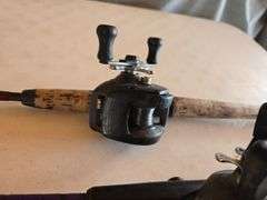 2- BAITCASTER FISHING POLES.