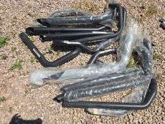 BLACK MOTORCYCLE EXHAUST PARTS.