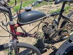 BIKE WITH ADDED ON GAS TANK AND ENGINE. RUNS, NEEDS CABLE WORK.
