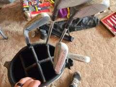 KIDS LEFT HAND GOLF CLUBS AND A FEW ADULT RIGHT HAND GOLF CLUBS.