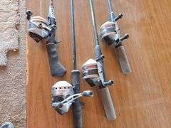 4- ZEBCO FISHING POLES WITH ZEBCO 33 REELS.