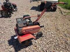 FRONT TINE TILLER RUNS ON CARB FLUID.