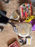 KIDS LEFT HAND GOLF CLUBS AND A FEW ADULT RIGHT HAND GOLF CLUBS.