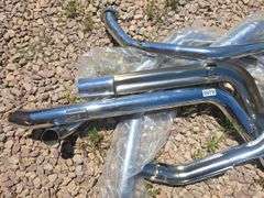 CHROME MOTORCYCLE EXHAUST PARTS.
