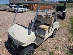 COLUMBIA GAS GOLF CART. RUNS REALLY GOOD! CAN'T SET PARK BRAKE, BRACKET NEEDS REPAIR. BATTERY. GOOD WHEELS AND TIRES JUST PUT ON!