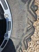 SET OF 4 POLARIS UTV TIRES AND WHEELS. NO LUG NUTS.