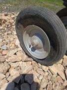 PULL BEHIND SEED/FERTILIZER SPREADER. BAD TIRES.