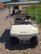COLUMBIA GAS GOLF CART. RUNS REALLY GOOD! CAN'T SET PARK BRAKE, BRACKET NEEDS REPAIR. BATTERY. GOOD WHEELS AND TIRES JUST PUT ON!