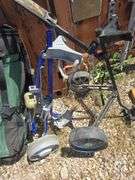 GOLF BAG AND 2 GOLF BAG CARTS.