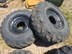 SET OF 4 POLARIS UTV TIRES WITH LUG NUTS.
