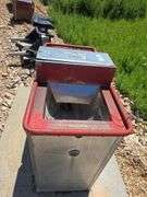 HOSKINS AUTO WATERER WITH HEATER. WITH SLAB OF CONCRETE.