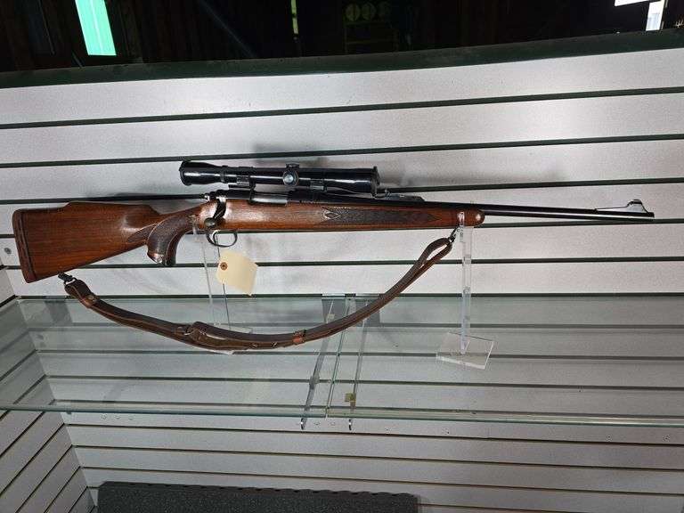 REMINGTON 700 ADL. 4-DIGIT SERIAL NUMBER! 243 WIN BOLT ACTION RIFLE. WEAVER SCOPE. STOCK HAS SOME SCUFFS AND SCRATCHES, LIGHT BLUING WEAR ON THE MUZZLE CROWN. SOFT CASE INCLUDED. S/N: 6334.
