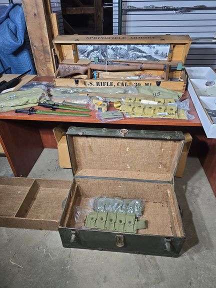 NIB. SPRINGFIELD ARMORY M1 GARAND. D-DAY COMMEMORATIVE #1244 OF 1944. COME WITH BAYONETS, SHIPPING CRATE, SLINGS, SOFT CASES, SNIPER CHEECK PADS, AMMO POUCHES. MILITARY TRUNK.