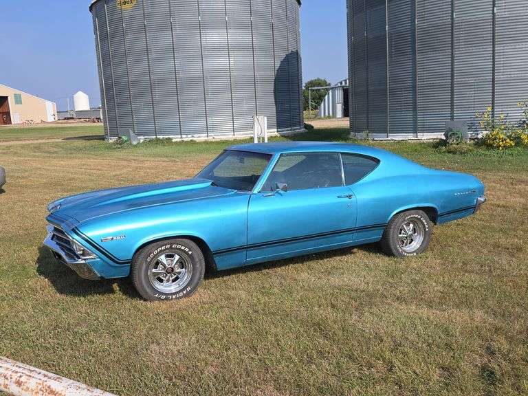 1969 CHEVROLET CHEVELLE MALIBU. ORIGINALLY 350 CAR, NOW HAS A 396CI ENGINE. AUTO. RUNS AND DRIVES GREAT. JUST HAD BRAKES GONE THROUGH. BUCKET SEATS. TRANSMISSION HAS A LEAK, WILL UPDATE WHERE IT IS COMING FROM SOON.  THE BODY AND PAINT COULD USE SOME WORK, WATCH THE WALK AROUND VIDEO ONCE IT IS UPLOADED. DRIVE IT LIKE IT IS OR MAKE IT PERFECT WHILE BEING ABLE TO TAKE IT OUT! ***THIS VEHICLE SELLS WITH TITLE!***